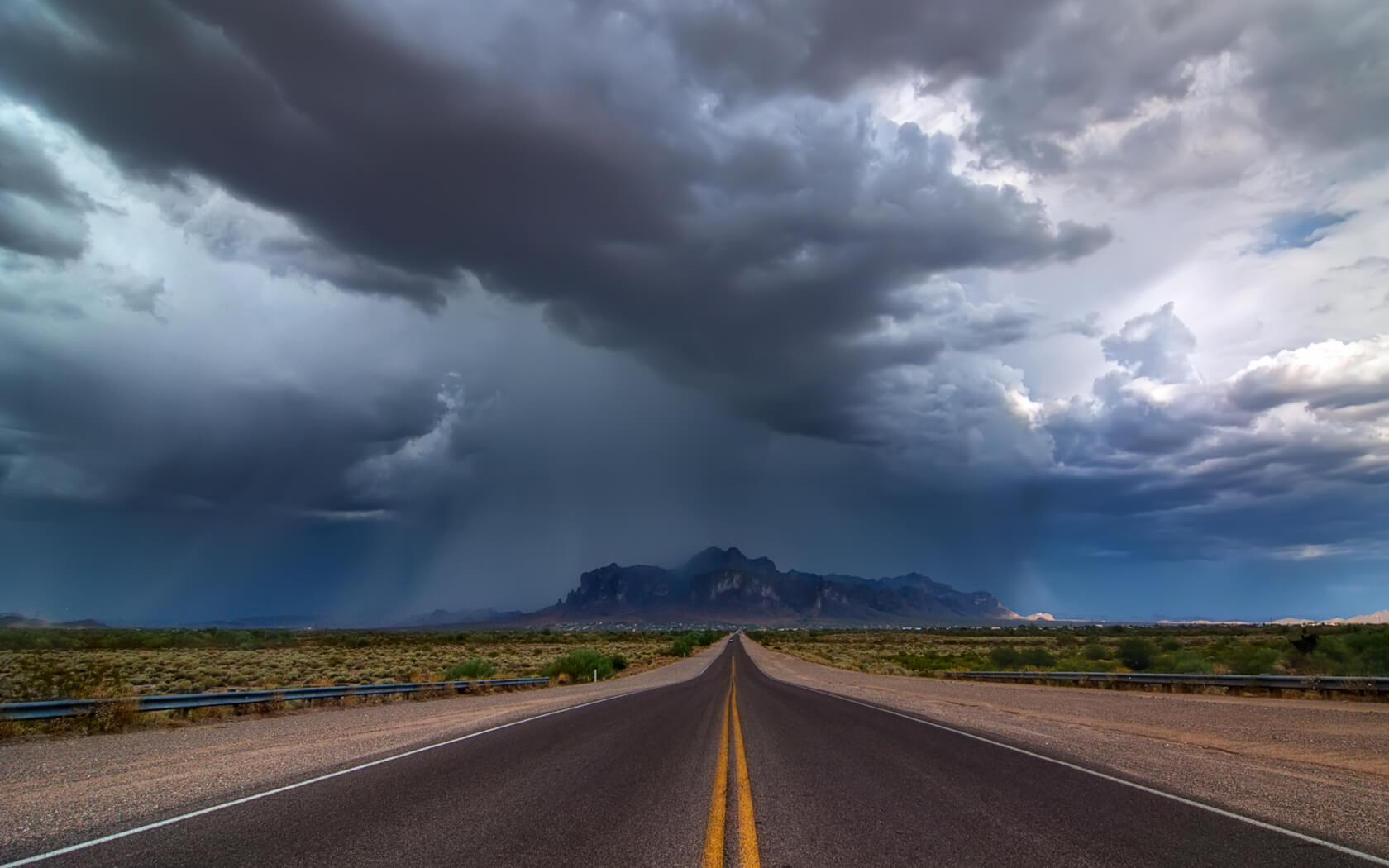 Monsoon clouds above a Northern Arizona desert highway. avaxnews.com