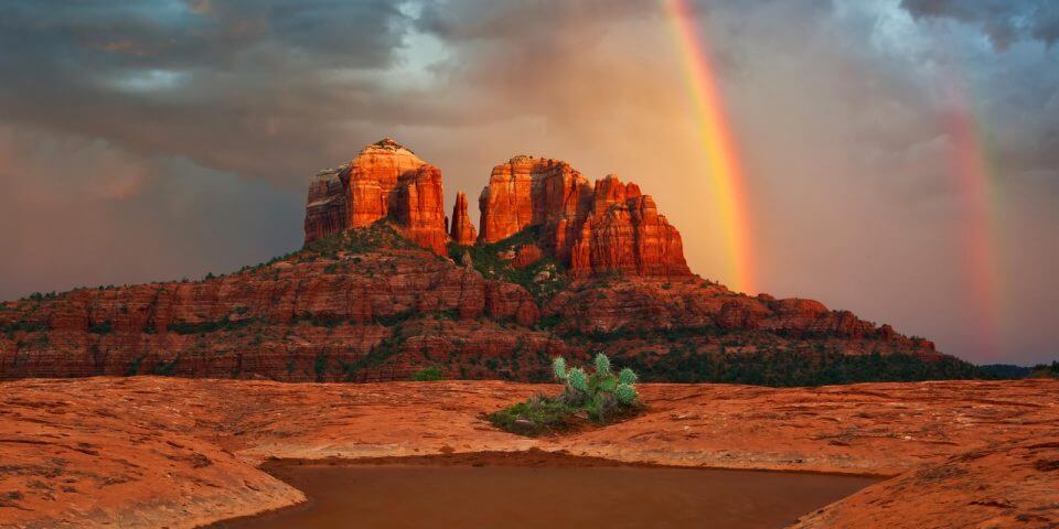 Pictures of rainbows behind Cathedral Rock.
