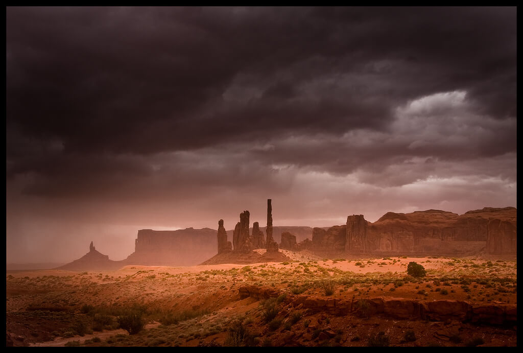 Monsoon storm clouds over Monument Valley. Flickr User KmrksY