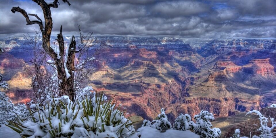 Winter at the Grand Canyon giving an excellent contrast of high desert and snow.