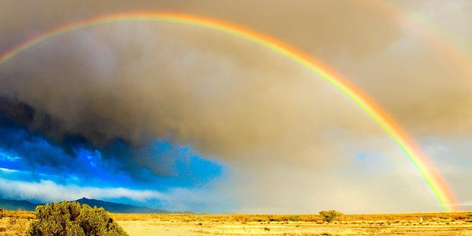 Picture of a rainbow over the Tucson desert.