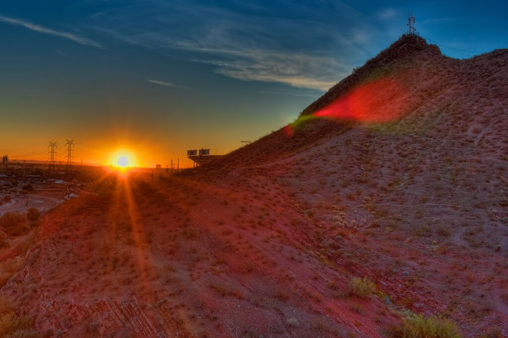 The sun sets over Tempe Butte. Flickr User CEBImagery