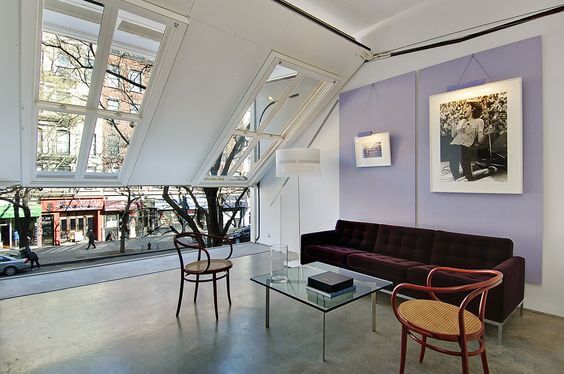 Interior shot of a East Village Brownstone with a retractable wall.
ny.curbed.com