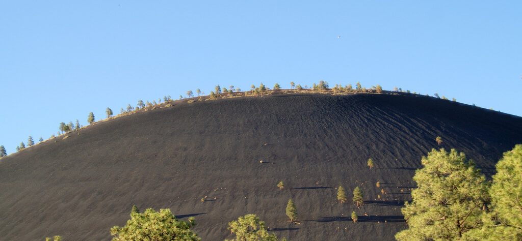 Black volcanic rocks alongside the Sunset Crater north of Flagstaff.Flickr User Amber Rainey