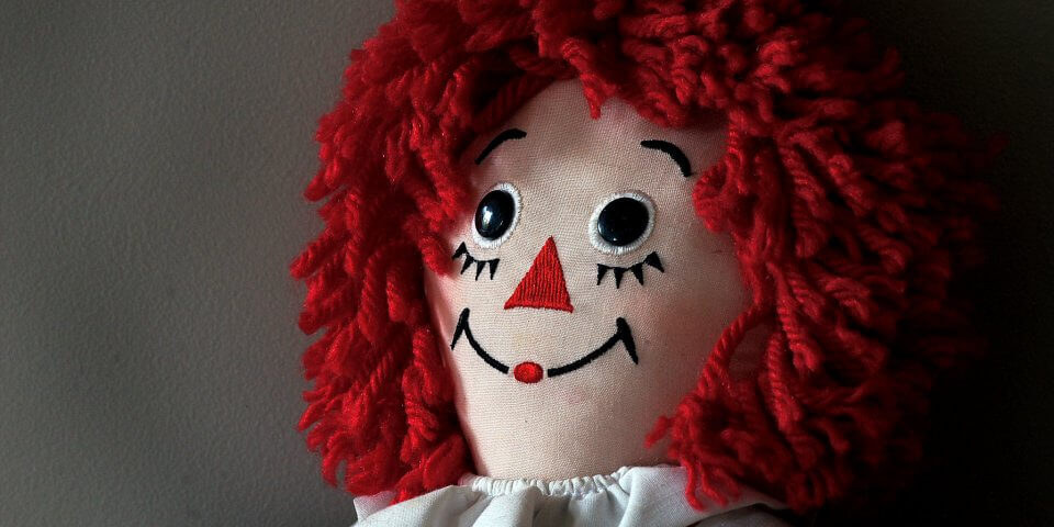 Photograph of Raggedy Ann doll close-up.
