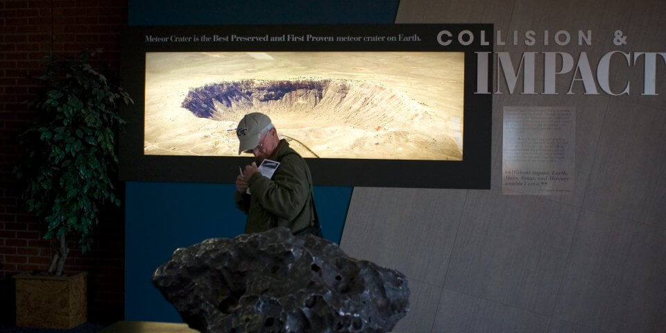 A chunk of the Meteor Crater meteorite inside the visitor's center museum. 