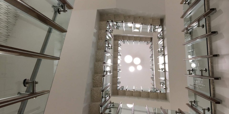 Looking up from the 1st-floor stairwell at Hayden Library
