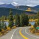 An Autumn day view of Mt. Blue Sky Scenic Byway at Echo Lake, with snow-capped Mt. Blue Sky towering in background. CO, US.