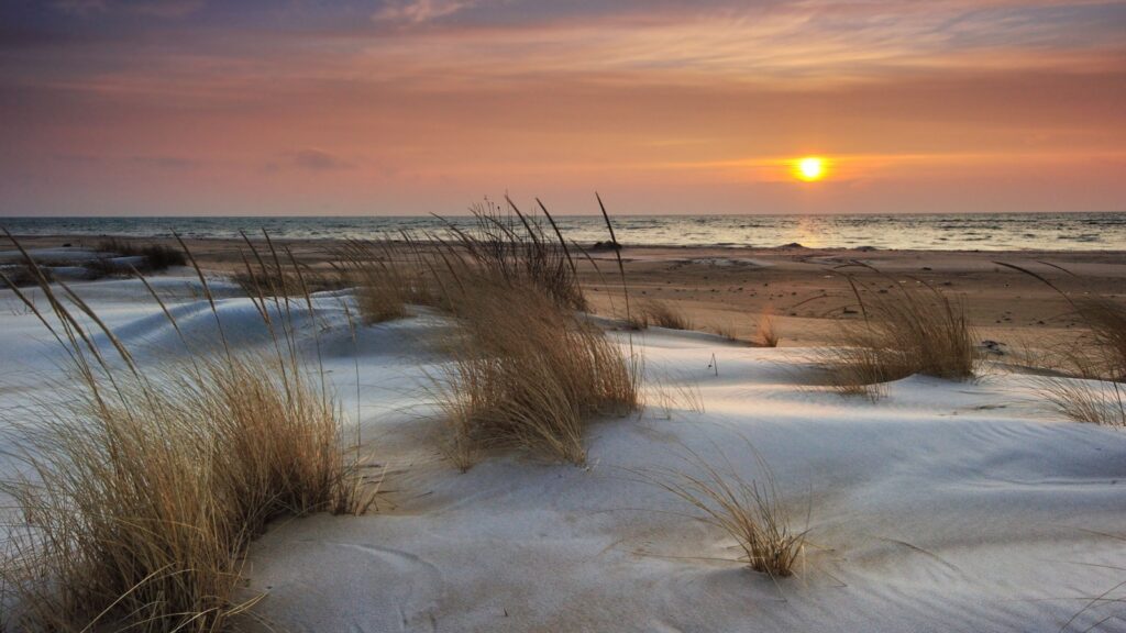 Sunrise over Lake Huron at Tawas Point State Park, Michigan.