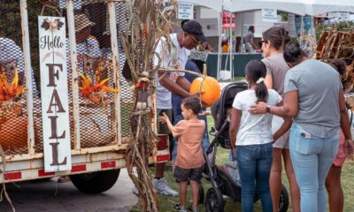 Pumpkin distribution to the families at fall festival.